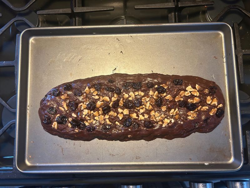 Forming fudge log with nuts and cherries