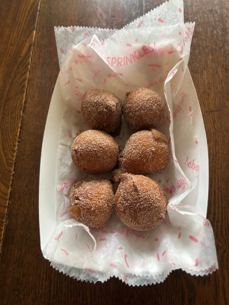 Finished cloudberry donut holes ready to serve
