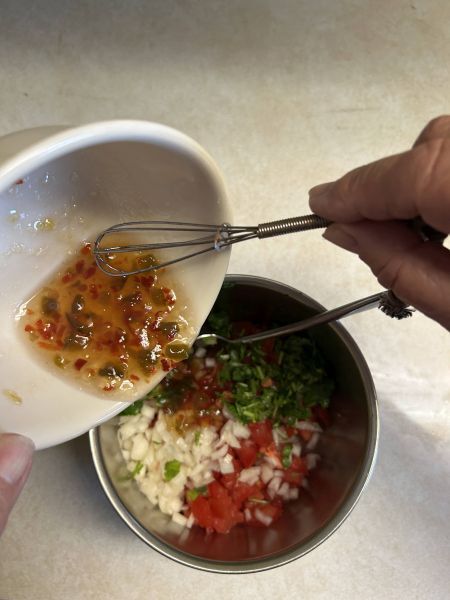 Chopped veggies and hot pepper jelly for fresh salsa