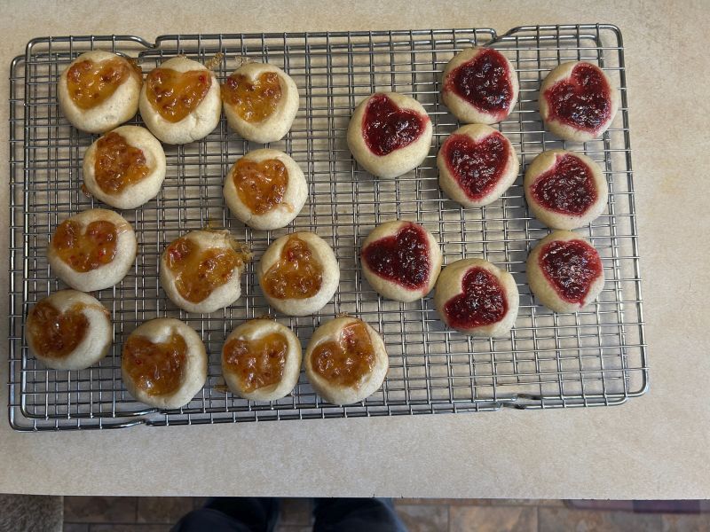 Baked heart thumbprint cookies with jam