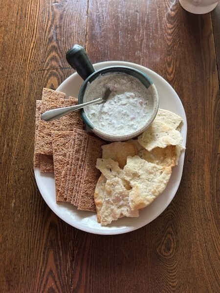A closeup of the herring dip and flatbreads.