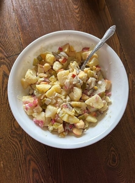 A closeup of the herring salad. 