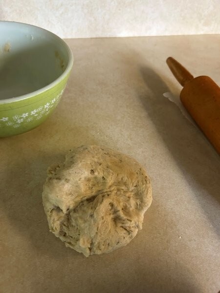 Kneaded rosemary flatbread dough.