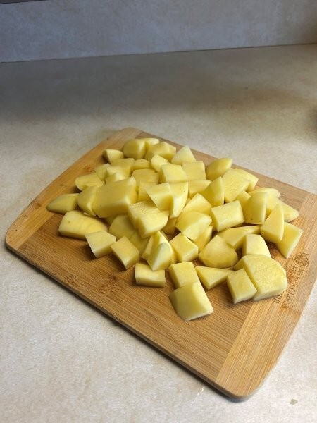Potatoes peeled and chopped—ready to boil.