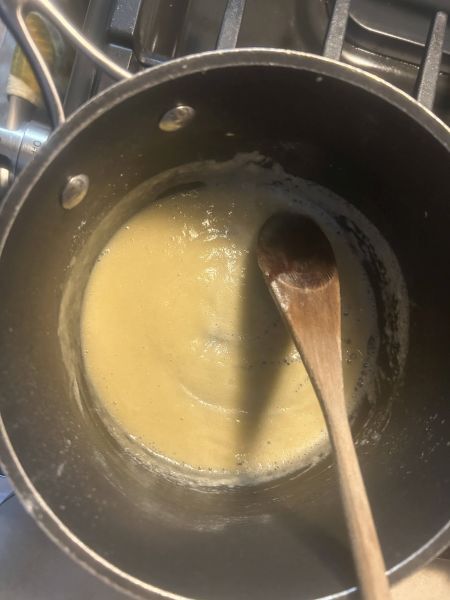Making a roux for Kålstuing using butter and flour in a saucepan