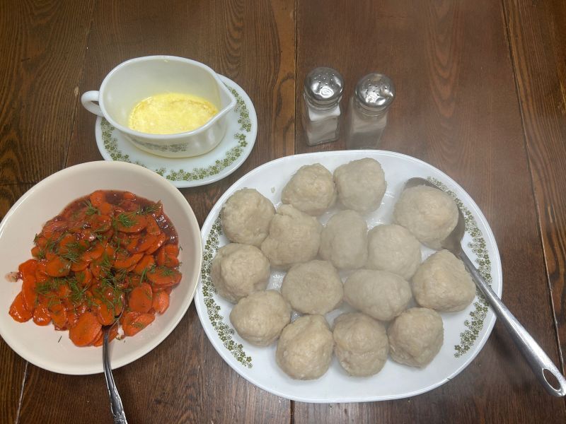 Norwegian Klubb potato dumplings served with Lingonberry glazed carrots