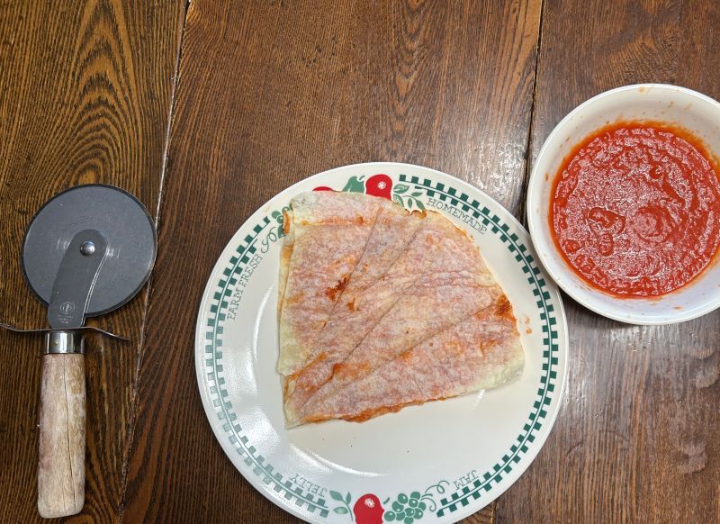 Lefse pizza dippers served with extra marinara and Parmesan