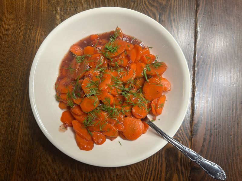 Lingonberry glazed carrots topped with fresh dill, a traditional Norwegian side dish