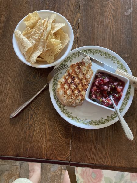 Lingonberry jalapeño salsa served with grilled pork chop and tortilla chips