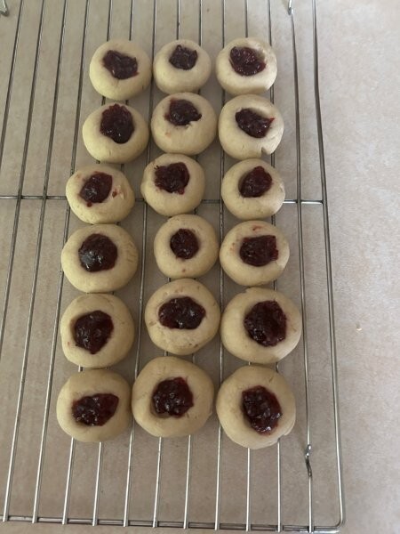 Thumbprint cookies baked and cooling.