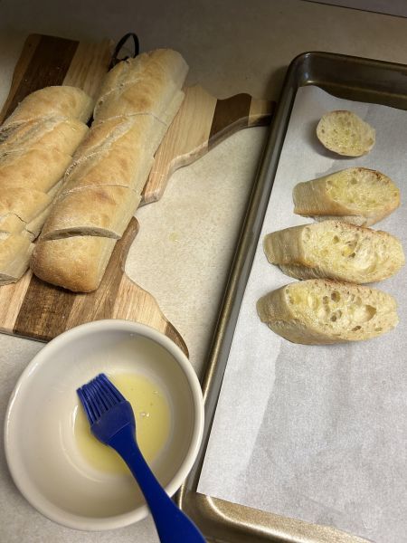 Baguette slices brushed with olive oil and baked