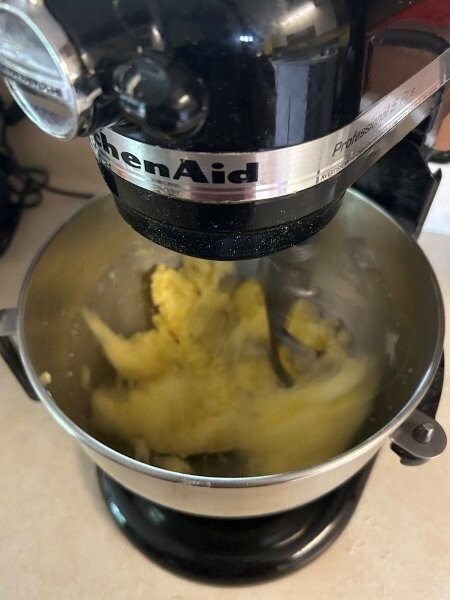 Cream together butter, sugar and egg yolks.