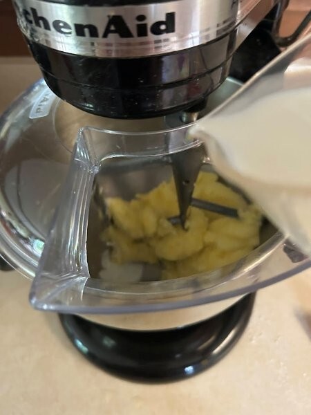 Alternate adding the milk/vinegar mixture and the flour mixture.