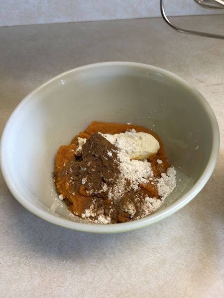 Ingredients for pumpkin lefse rolls with pumpkin puree and cream cheese.