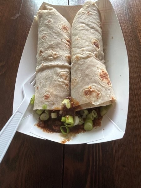 Finished lefse wraps with gravy and green onions