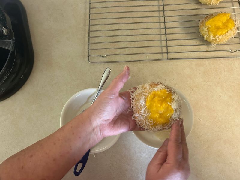 Skolebrod coated with shredded coconut