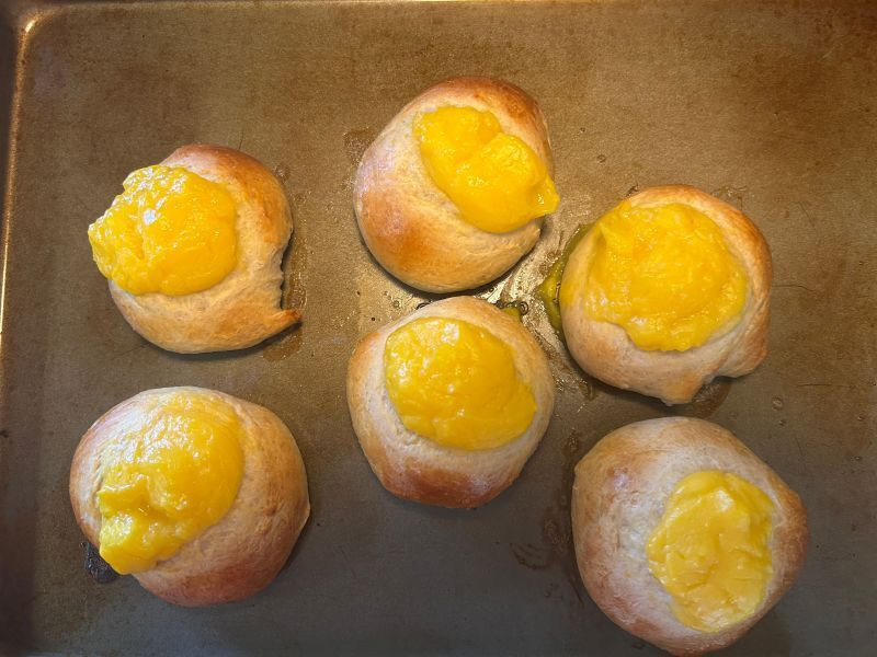 Freshly baked Skolebrod buns cooling