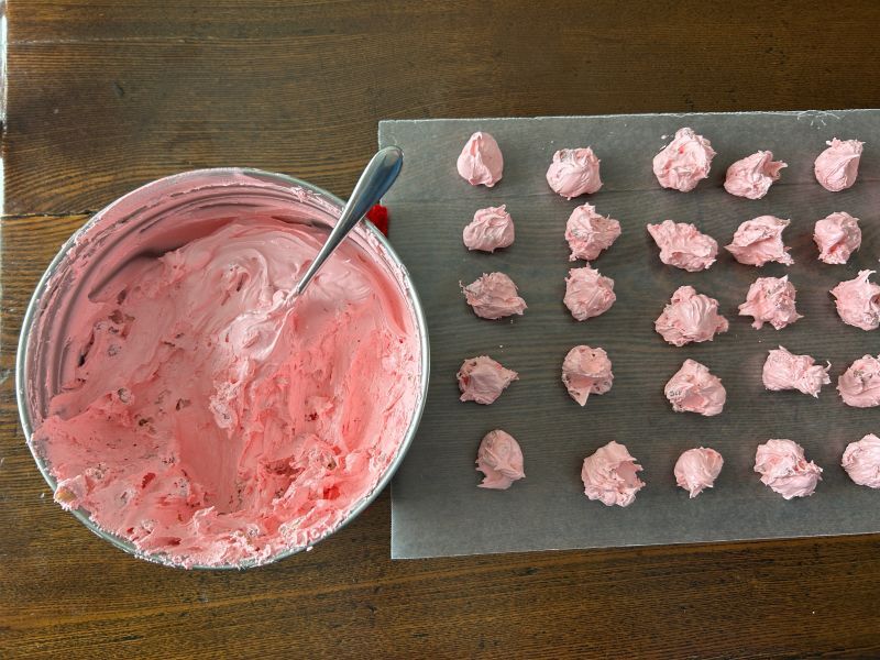 Finished strawberry divinity on waxed paper