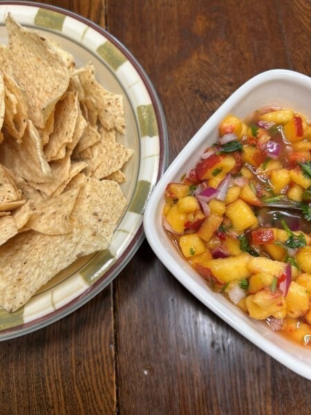 Tortilla chips with peach salsa